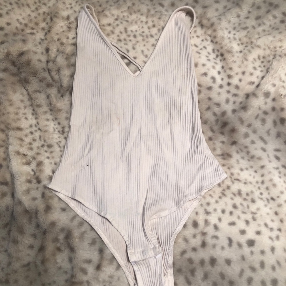 Deep v cut body suite. Very sexy!!! Boutique brand